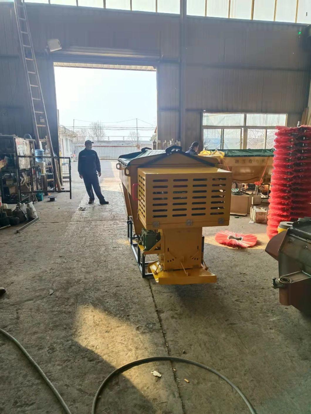 Skid Steer Truck Use Salt Spreader for Snow Road