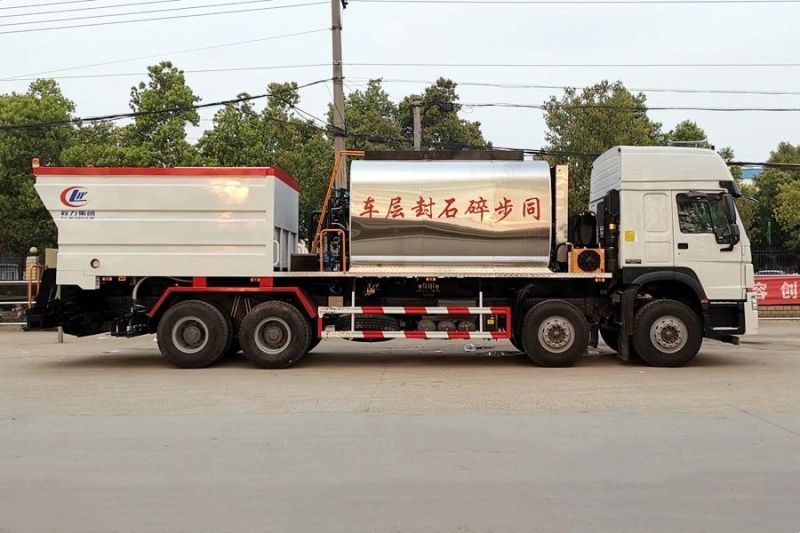 HOWO 6X4 8X4 Synchronous Chip Sealer Truck Bitumen Gravel Distribution Truck for Road Construction Paving Machinery Highway Maintenance