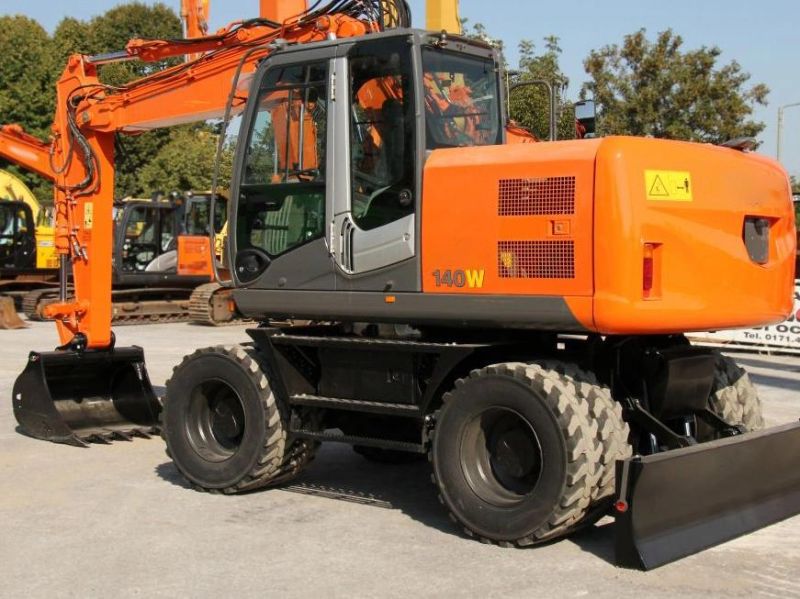 Hw140 15 Ton Wheel Excavator with Grab & Hydraulic Hammer
